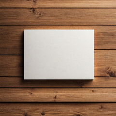 White panel on wooden background, blank space for text