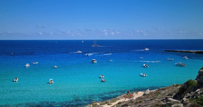 panorama of the mediterranean coast with boat in background, with a blue sea and clear sky, concept of vacation