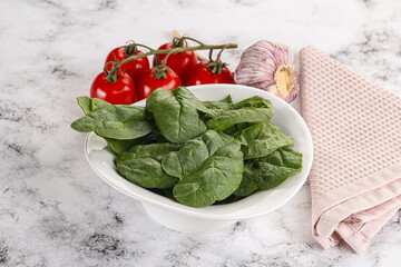 Green spinach leaves in the bowl