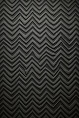Charcoal zig-zag wave pattern carpet texture background