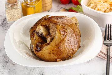 Baked pork knee with spices