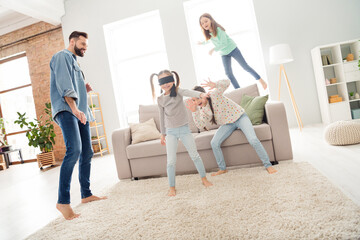Full size photo of four people cheerful handsome guy excited adorable small girls play have fun...