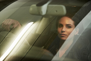 Woman, driver and look through windshield, portrait and car for transportation and night commute....