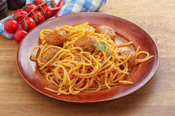 Spaghetti with meatball in tomato sause