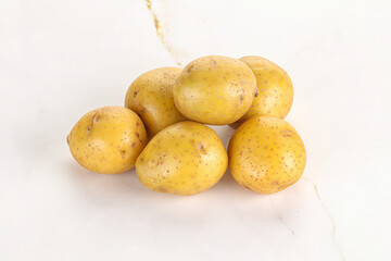 Raw young baby potato heap