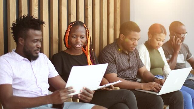 Group of diverse people are waiting for a job interview