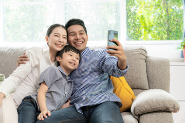 happy family take a selfie at home