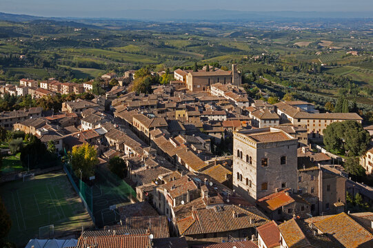 Unesco world heritage chimneys of San Gimignano in the Tuscan countryside at dusk