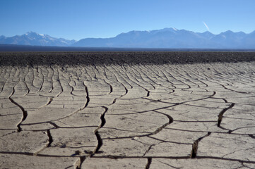 dry and cracked soil in the desert