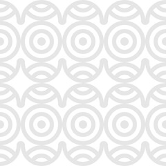Seamless trendy pattern of circles and arcs, geometric white shapes for textiles and wallpaper. Festive Christmas pattern on a gray background.