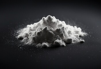 White powder isolated on black background top view with clipping path
