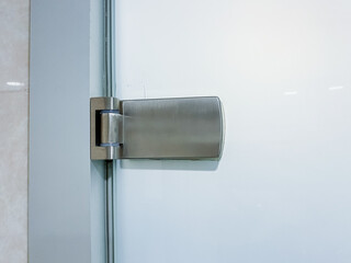 Stainless steel door hinge for glass, a secure fixture with a nickel handle