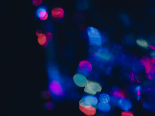 Blurred lights, dark night for mysterious abstract background.