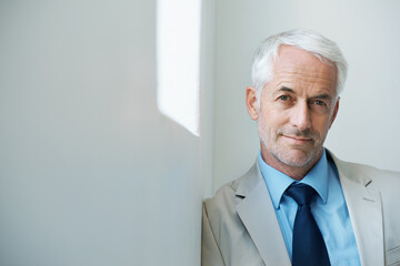 Portrait, mature man and corporate in suit with copy space, confidence and serious look with...