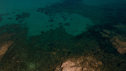 Fototapeta na wymiar Drone photography of Tamarone beach with turquoise waters in Cap Corse