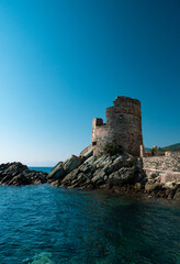 Drone photography genoise tower, cala and barcaggio beach with turquoise waters in Cap Corse 