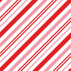 Seamless pattern with red and pink candy cane stripes. Christmas packaging print.