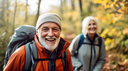 Fototapeta premium Hiking happiness: seniors trekking through nature, sharing the joys of the great outdoors