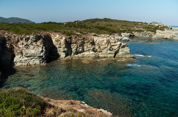 Drone photography genoise tower, cala and barcaggio beach with turquoise waters in Cap Corse 