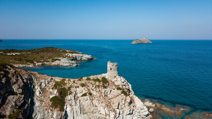 Fototapeta na wymiar Drone photography genoise tower, cala and barcaggio beach with turquoise waters in Cap Corse 