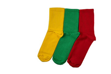 Yellow, red and green socks on a white background