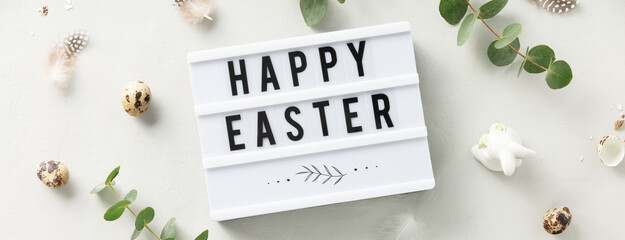  lightbox text Happy Easter and eucalyptus branches on light grey background