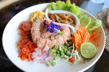 Thai food named Khao Kluk Shrimp Paste It was beautifully arranged in a white plate. Looks delicious. Thailand food concept
