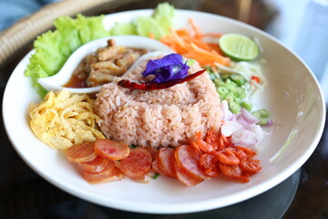 Thai food named Khao Kluk Shrimp Paste It was beautifully arranged in a white plate. Looks delicious. Thailand food concept