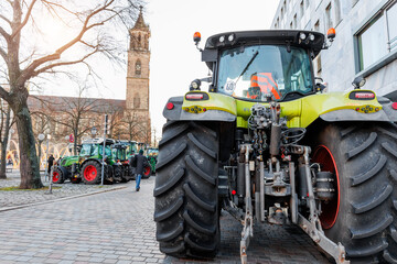 Farmers union protest strike against government Policy in Germany Europe. Tractors vehicles blocks...