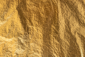 Texture Of Gold Foil Shiny Glitter Background