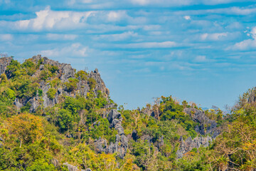 Fototapeta na wymiar Aerial panorama of Thailand's National Park, there is a well-known tourist destination with views of the forest and limestone mountain.