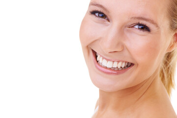 Portrait, teeth and beauty of happy woman, skincare and shine in studio isolated on a white...