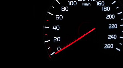 Close up shot of speedometer in car. Car dashboard. Dashboard details with indication lamps.Car instrument panel. Dashboard with speedometer
