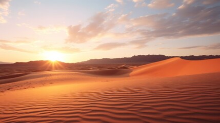 Desert landscape with sand dunes illuminated by the setting sun