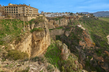 Fototapeta na wymiar The village of Ronda on top of the cliffs in Andalusia, Spain.