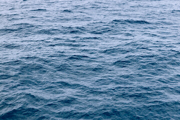 Fototapeta premium The natural texture of the Arctic Sea, with its gentle undulations, provides a soothing and aesthetically pleasing backdrop for creative use