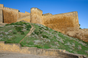 Fototapeta na wymiar At the walls of an ancient fortress. Derbent, Republic of Dagestan, Russia