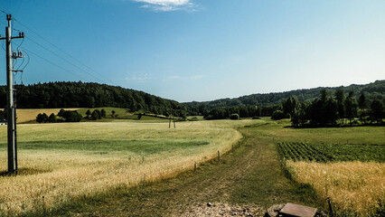 Landscape of field and hills of Wiezyca, Kashubian region in Poland. - obrazy, fototapety, plakaty