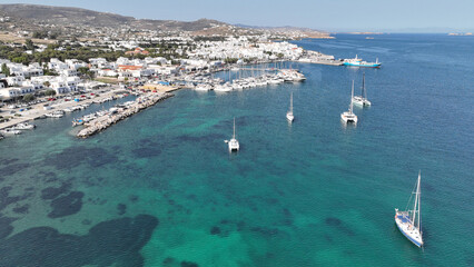 Aerial drone photo of traditional whitewashed picturesque main village of Paroikia or hora with unique Cycladic architecture, Paros island, Cyclades, Greece - obrazy, fototapety, plakaty