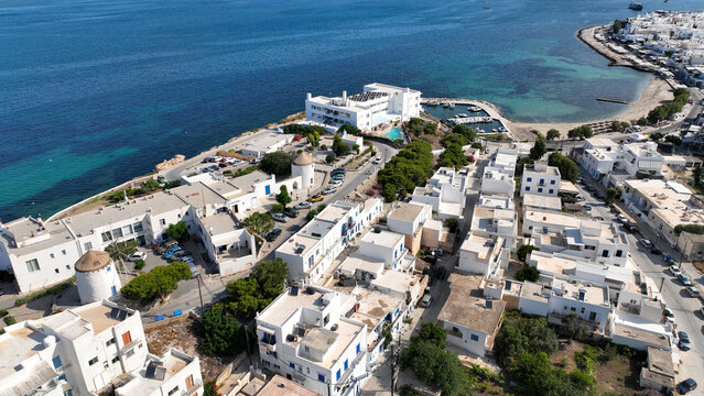 Aerial drone photo of traditional whitewashed picturesque main village of Paroikia or hora with unique Cycladic architecture, Paros island, Cyclades, Greece