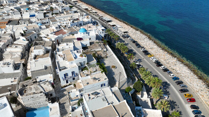 Aerial drone photo of traditional settlement and Frankish Castle of Paroikia with unique Cycladic...