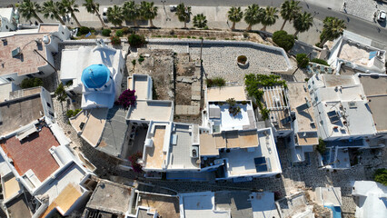 Aerial drone photo of traditional whitewashed picturesque main village of Paroikia or hora with...