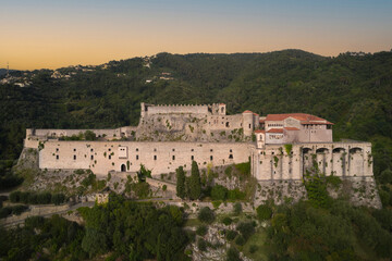 Fototapeta na wymiar Historic castle of Italy aerial view. Aerial panorama of Castello Malaspina di Massa in Italy.