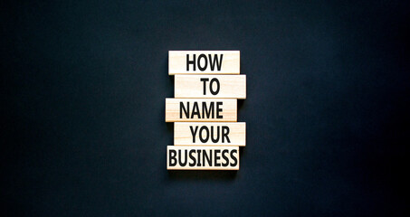 How to name your business symbol. Concept words How to name your business on wooden blocks. Beautiful black table black background. How to name your business concept. Copy space.