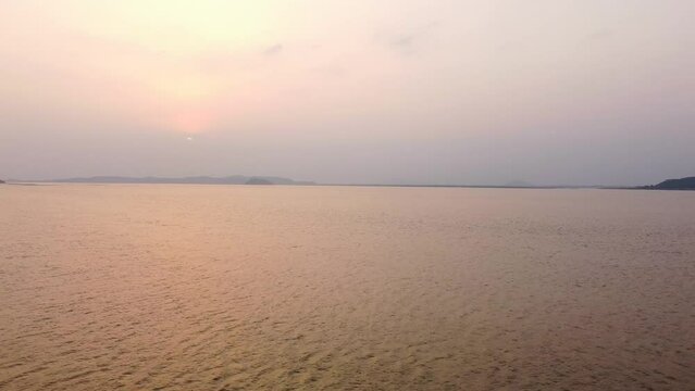 Sunset on the river brahmaputra in India  guwahati in indian state of  assam. 
