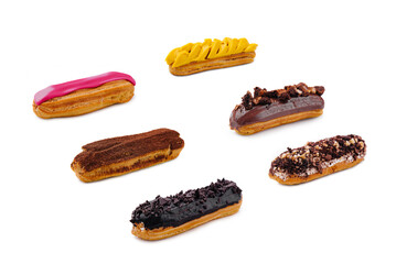 assorted delicious French eclairs on a white background