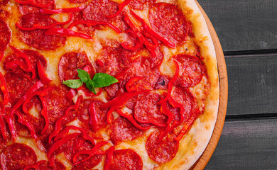 tasty pepperoni pizza with red bell peper