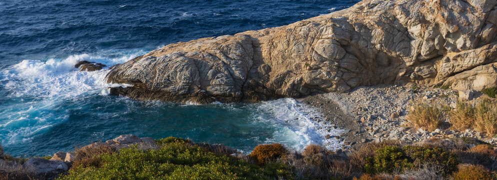 Rocky coast with quaint cove, Ikaria, North Aegean Islands, Greece