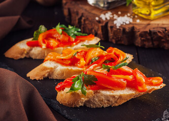 Bruschettas on cutting board close up