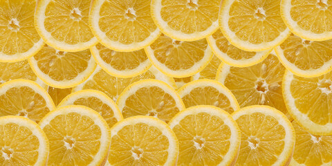 Lemon slices background. Slices of lemon mixed theme.